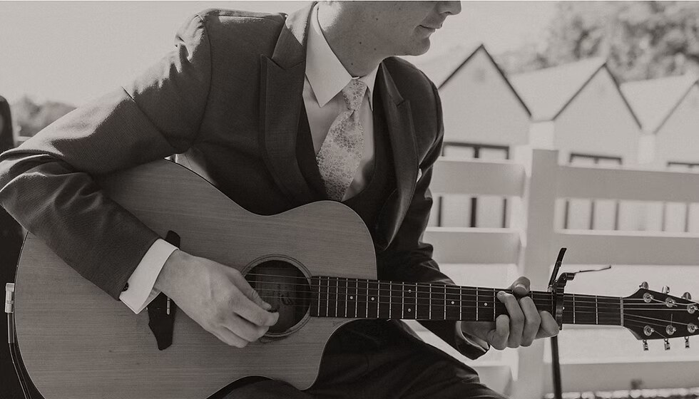 Mike Hongslo playing guitar